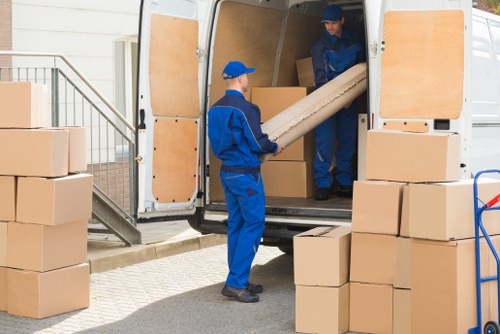 Moving service in Canary Wharf with boxes and furniture