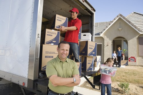 Loading boxes and furniture for a Canary Wharf man with a van move
