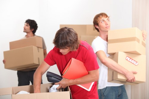 Local removals team planning access in Canary Wharf