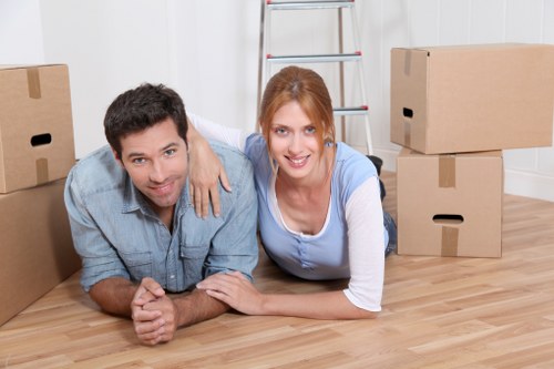 Professional man and van in Canary Wharf managing urban moving tasks