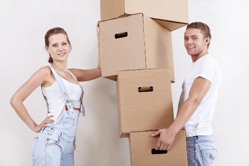 Careful wrapping and boxing of household items for local relocation