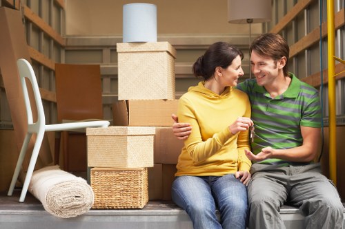Professional movers handling student belongings in Canary Wharf