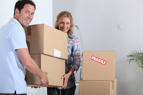 Packed office boxes and workstations ready for transport